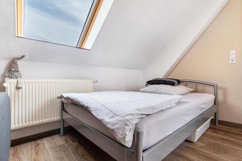 Postel nebo postele na pokoji v ubytování Ferienwohnung Moritz