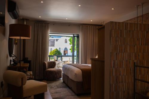 Katil atau katil-katil dalam bilik di Le Petit Manoir Boutique Hotel