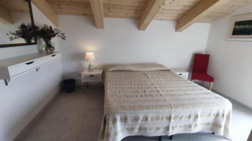 Postel nebo postele na pokoji v ubytování Rifugio Belvedere