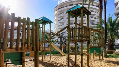 a playground in front of a hotel at Servatur Waikiki in Playa del Ingles
