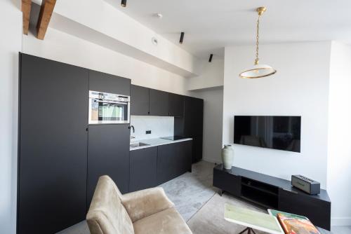 TV/Unterhaltungsangebot in der Unterkunft O'Lord, 4 Etoiles, Residence de Luxe Champs-Elysees