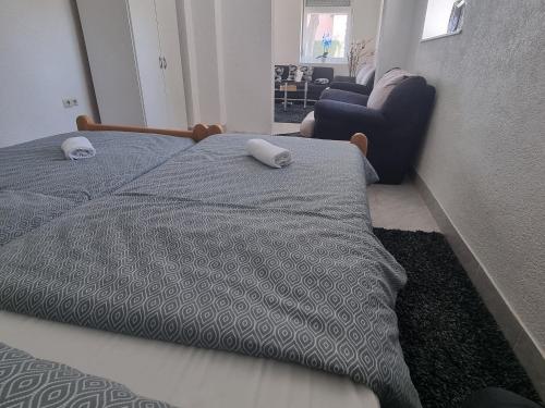 Ένα ή περισσότερα κρεβάτια σε δωμάτιο στο Apartmani Velić