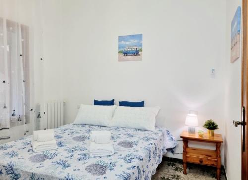 Ένα ή περισσότερα κρεβάτια σε δωμάτιο στο Villa Giusy