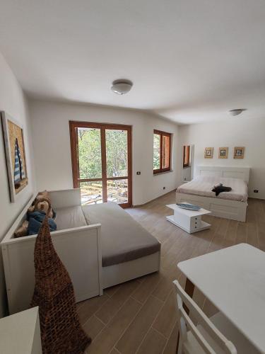 Ένα ή περισσότερα κρεβάτια σε δωμάτιο στο Casa Cossiga