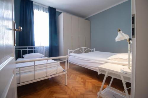 a hospital room with a bed and a window at Lux Apartment Duje in Split