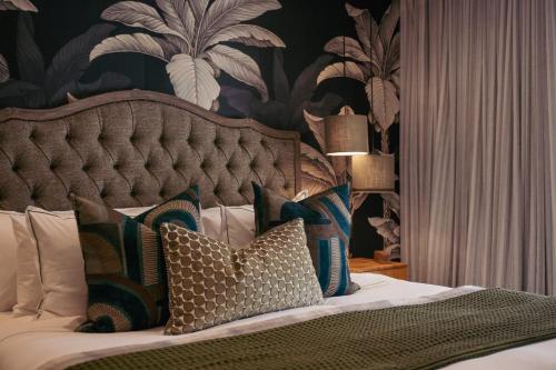 Katil atau katil-katil dalam bilik di Le Petit Manoir Boutique Hotel
