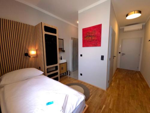 Ein Bett oder Betten in einem Zimmer der Unterkunft Guesthouse Purbach