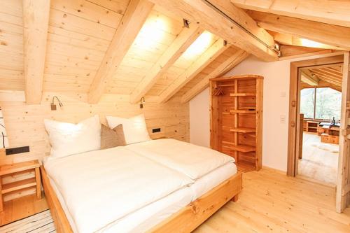 Postel nebo postele na pokoji v ubytování Chalet Die Mühle