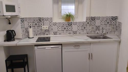 Kuchyň nebo kuchyňský kout v ubytování La Casita de Mari
