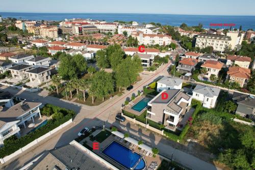 an aerial view of a city with houses at Camyuva Beach Hotel in Kemer