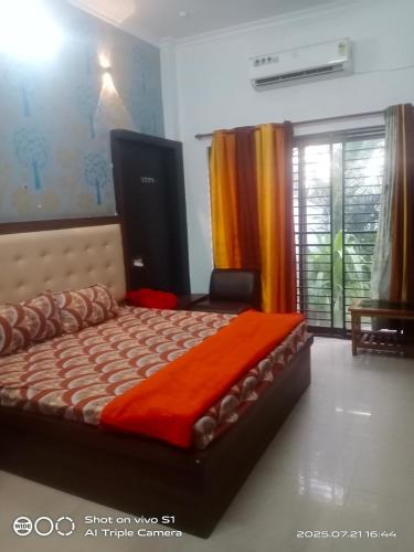 Una cama o camas en una habitación de Cz Inn