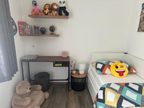 Postel nebo postele na pokoji v ubytování APARTMANI TEA