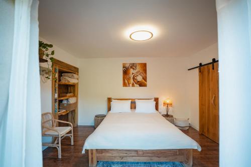 a bedroom with a large bed in a room at Unique Suite In Eilat in Eilat