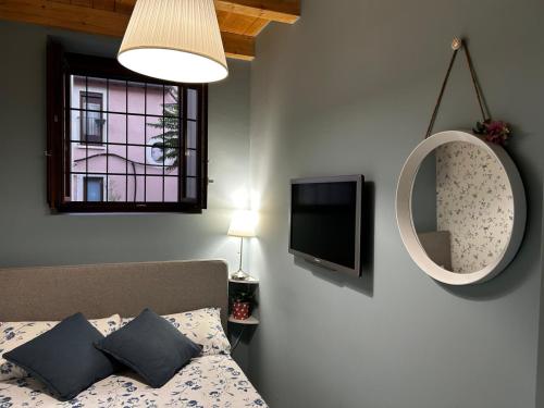 TV a/nebo společenská místnost v ubytování Casa Vacanze Boutique House Casa Spartaco