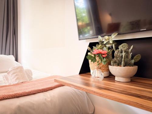 Ένα ή περισσότερα κρεβάτια σε δωμάτιο στο De Pijp Boutique Hotel