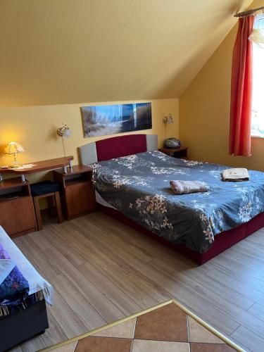 Postel nebo postele na pokoji v ubytování Pokoje nad Morzem-Wajolet