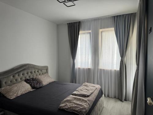 Postel nebo postele na pokoji v ubytování Apartament Grace