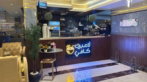 Εστιατόριο ή άλλο μέρος για φαγητό στο Lambert ApartHotel