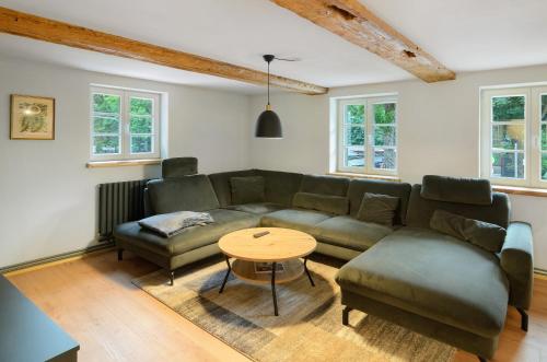 Posezení v ubytování Altes Höhlenführerhaus