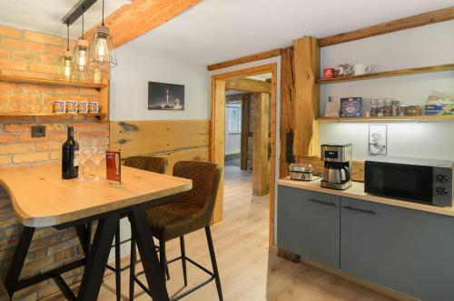 Kuchyň nebo kuchyňský kout v ubytování Altes Höhlenführerhaus