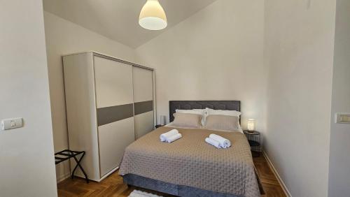 Postel nebo postele na pokoji v ubytování Villa Lucija