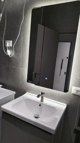 Un baño de Hermanos Apartment 114