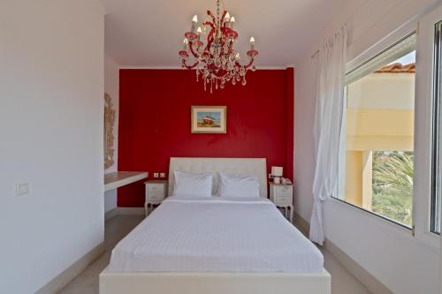 Ένα ή περισσότερα κρεβάτια σε δωμάτιο στο Kelyfos Hotel 