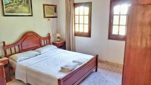 Ένα ή περισσότερα κρεβάτια σε δωμάτιο στο Incredible house nearby the river