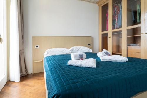 Ένα ή περισσότερα κρεβάτια σε δωμάτιο στο Aa Apartments La Gioconda