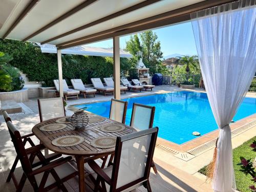 Πισίνα στο ή κοντά στο Stamnelia Villa