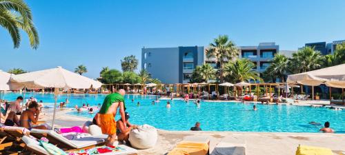 a group of people in the swimming pool at a resort at Sentido Marillia Resort & Spa in Hammamet