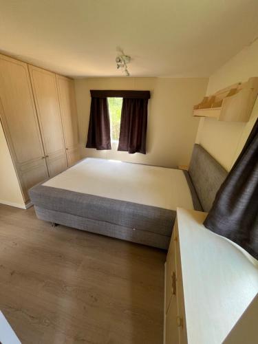 Ένα ή περισσότερα κρεβάτια σε δωμάτιο στο Camping le Faulion