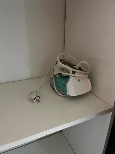 a white purse sitting on a counter in a room at La Casa Luminosa 3 in Larache