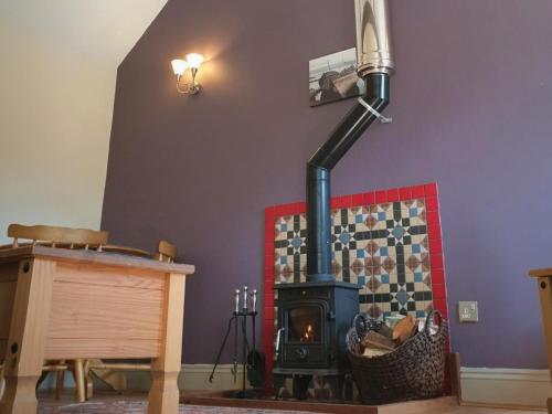 Gambar di galeri bagi Stables Cottage di Garton