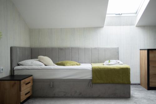 Postel nebo postele na pokoji v ubytování Apartament Pod Łanem
