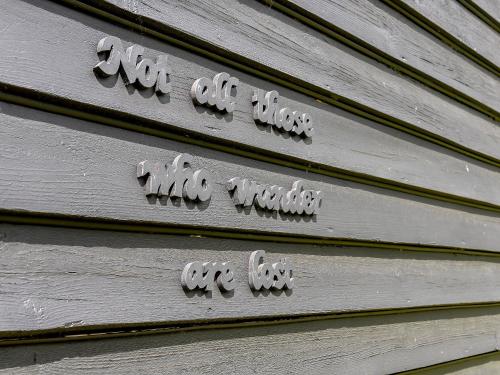 a sign on the side of a building at Brook Farm Annex in Tenterden