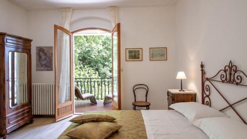 Giường trong phòng chung tại Villa Il Masseto
