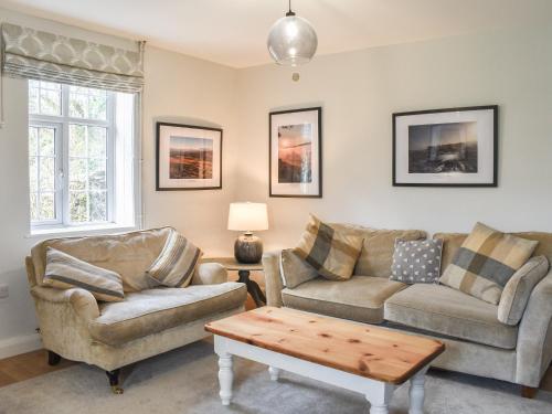 Posezení v ubytování Crogen Gatehouse Lodge