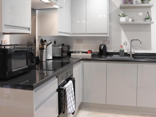 Una cocina o zona de cocina en Llety Cariad