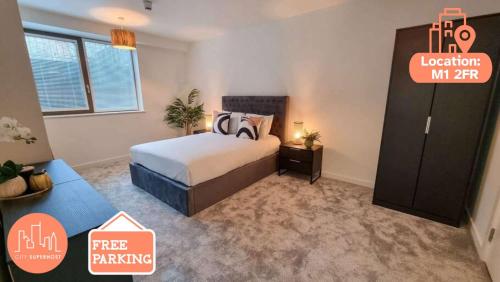 a bedroom with a bed and a dresser at Stunning 4-bedroom Townhouse with Free Parking in Manchester
