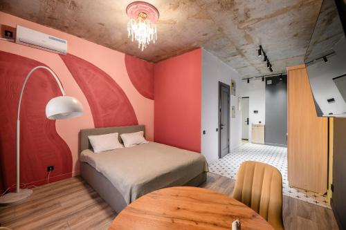 Ένα ή περισσότερα κρεβάτια σε δωμάτιο στο Уютная около Арбата, ЖК Меридиан