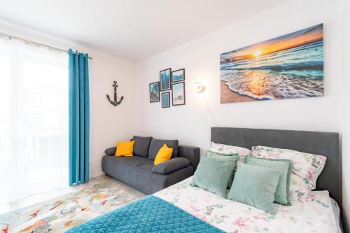 Postel nebo postele na pokoji v ubytování APARTAMENT NADMORSKI