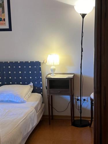 Ένα ή περισσότερα κρεβάτια σε δωμάτιο στο La Cour Zaepffel