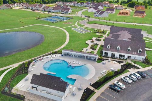 an aerial view of a resort with a swimming pool at Cozy SFH for Active Adults in Middletown