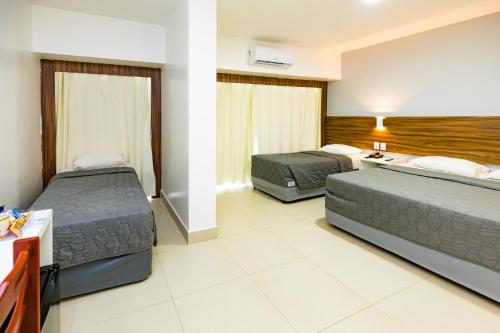 Кровать или кровати в номере El Aram Beach & Convention