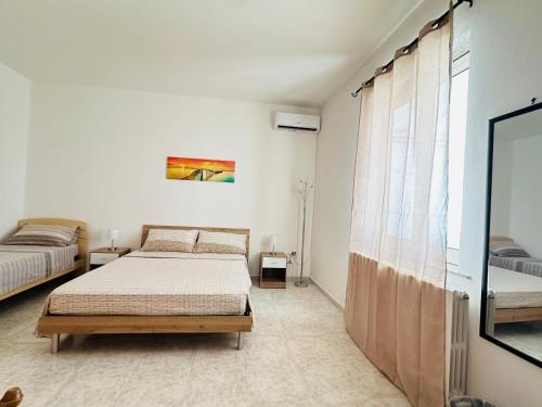 Postel nebo postele na pokoji v ubytování Giorgia