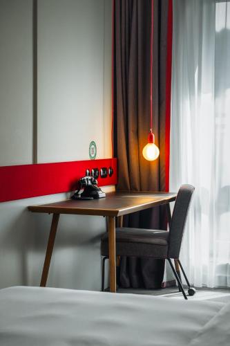 Кровать или кровати в номере Hotel PULSE8