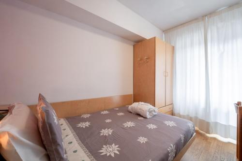 Letto o letti in una camera di Hotel il Caminetto Sport