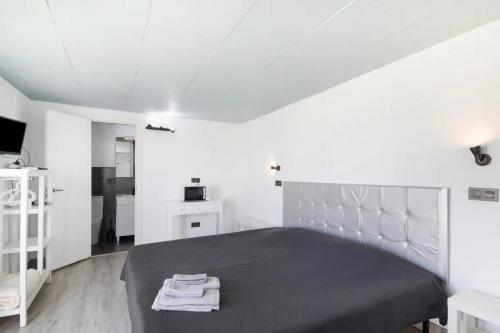 Ένα ή περισσότερα κρεβάτια σε δωμάτιο στο Suite con terraza y jacuzzi privada en Maspalomas