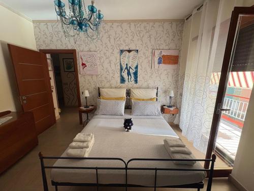 Ένα ή περισσότερα κρεβάτια σε δωμάτιο στο Casa Vacanze PepeNero